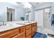 Bathroom boasts double vanity, shower, and linen storage at 1811 Charter Dr, Rock Hill, SC 29732