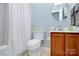 Clean bathroom with a shower/tub combo and wood vanity at 1811 Charter Dr, Rock Hill, SC 29732