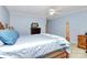 Spacious bedroom with a wooden post bed and dresser at 1811 Charter Dr, Rock Hill, SC 29732