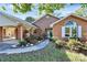 Brick ranch house with landscaped yard, covered carport, and walkway at 1811 Charter Dr, Rock Hill, SC 29732