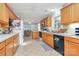 Kitchen boasts ample cabinetry and a view into the dining area at 1811 Charter Dr, Rock Hill, SC 29732