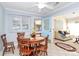 Bright dining area with light blue walls and wood table set at 1811 Charter Dr, Rock Hill, SC 29732