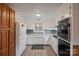 Efficient kitchen with white cabinetry and appliances at 221 4Th Ne St, Conover, NC 28613