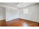 Bright bedroom with hardwood floors, closet, and window at 28461 Canton Rd, Albemarle, NC 28001