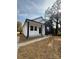 Two-toned house exterior with front porch and landscaping at 508 S Boyd St, Gastonia, NC 28052