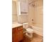 Clean bathroom with a shower/tub combo, wood vanity, and tile floor at 7374 Sun Dance Dr, Fort Mill, SC 29707