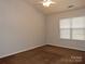 Bright bedroom featuring a ceiling fan and brown carpet at 7374 Sun Dance Dr, Fort Mill, SC 29707