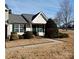 Attractive exterior, showcasing a well-maintained tan home and landscaping at 7374 Sun Dance Dr, Fort Mill, SC 29707