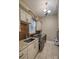 Well-equipped laundry room with decorative tile backsplash, sink, and ample storage at 9267 Egret Rdg # 41, Belmont, NC 28012