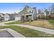 Two-story house with gray siding, white trim, and a two-car garage at 3074 Ballester Rd, Fort Mill, SC 29707