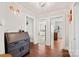 Inviting hallway with views into kitchen and additional rooms at 34004 Kingsley Dr, Albemarle, NC 28001