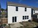 View of the home's back, showing a patio and fenced yard at 533 Copes Ct, Kannapolis, NC 28081