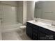 Bathroom with double vanity, tub, and shower at 533 Copes Ct, Kannapolis, NC 28081