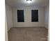 Spacious bedroom with neutral walls and carpeted floor at 533 Copes Ct, Kannapolis, NC 28081