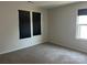 Bright bedroom with neutral walls and carpeted floor at 533 Copes Ct, Kannapolis, NC 28081