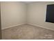 Spacious bedroom with neutral walls and carpet at 533 Copes Ct, Kannapolis, NC 28081