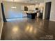 Open floor plan showcasing kitchen, living, and dining areas at 533 Copes Ct, Kannapolis, NC 28081