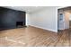 Bright living room featuring hardwood floors and a fireplace at 406 Harris Ln, Monroe, NC 28112