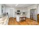 Renovated kitchen, granite counters, island, stainless steel appliances at 4550 Zion Church Rd, Concord, NC 28025