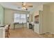 Spacious bedroom with built-in shelving and a ceiling fan at 606 33Rd Street Ne Pl, Conover, NC 28613