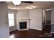 Living room featuring a marble fireplace, hardwood floors, and neutral-toned walls at 1091 Farm Pond Ln, Rock Hill, SC 29732