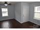 Living room with dark hardwood floors and light walls, offering a bright and airy atmosphere at 1091 Farm Pond Ln, Rock Hill, SC 29732