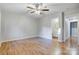 Bedroom with hardwood floors and en-suite bathroom at 13446 Idlefield Ln, Matthews, NC 28105
