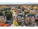 Aerial view of the house and surrounding neighborhood in autumn at 157 Montibello Dr, Mooresville, NC 28117