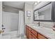 Clean bathroom with tub/shower combo and granite countertop at 157 Montibello Dr, Mooresville, NC 28117