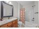 Clean bathroom with granite countertop and updated fixtures at 157 Montibello Dr, Mooresville, NC 28117