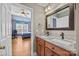 Bathroom with double vanity and view of bedroom at 157 Montibello Dr, Mooresville, NC 28117