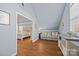 Cozy sitting area with hardwood floors and a view of the bedroom at 157 Montibello Dr, Mooresville, NC 28117