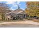 Community clubhouse with outdoor seating and landscaping at 157 Montibello Dr, Mooresville, NC 28117