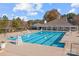 Community lap pool with ample deck space and shaded areas at 157 Montibello Dr, Mooresville, NC 28117