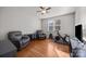 Relaxing exercise room with hardwood floors and home gym equipment at 157 Montibello Dr, Mooresville, NC 28117