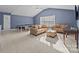 Spacious game room with ping pong table and seating area at 157 Montibello Dr, Mooresville, NC 28117