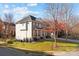 Brick and siding two-story home with front yard at 157 Montibello Dr, Mooresville, NC 28117