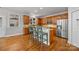 Kitchen with stainless steel appliances and an island with seating at 157 Montibello Dr, Mooresville, NC 28117