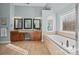 Elegant bathroom with double vanity, soaking tub, and separate shower at 157 Montibello Dr, Mooresville, NC 28117