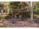 Pergola with fire pit and seating area in backyard at 157 Montibello Dr, Mooresville, NC 28117