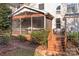 Screened porch with deck and steps to the yard at 157 Montibello Dr, Mooresville, NC 28117
