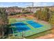 Two tennis courts and a basketball court in a community setting at 157 Montibello Dr, Mooresville, NC 28117