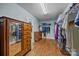 Large walk-in closet with ample shelving and dresser at 157 Montibello Dr, Mooresville, NC 28117