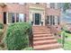 Brick steps leading to a double-door entry at 7517 British Gardens Ln, Charlotte, NC 28277