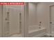 Bathroom with a bathtub and shower combination at 8000 Kennesaw Dr, Gastonia, NC 28056