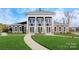Community center exterior with columns and landscaping at 8000 Kennesaw Dr, Gastonia, NC 28056
