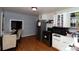 Kitchen with wood floors and stainless steel appliances at 1840 Findlay St, Gastonia, NC 28052