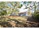 Large backyard with a gray house and plenty of green space at 403 N Ransom St, Gastonia, NC 28052