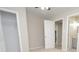 Bright bedroom with carpeted floor, ample closet space, and access to a hallway at 403 N Ransom St, Gastonia, NC 28052