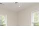 Bedroom with light walls, ceiling fan, and window blinds at 403 N Ransom St, Gastonia, NC 28052